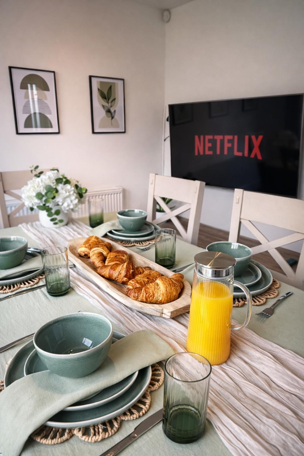 Dining table prepared with breakfast in a Kalen Luxury Stays property